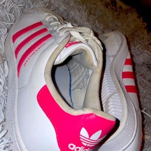 Pink and white adidas